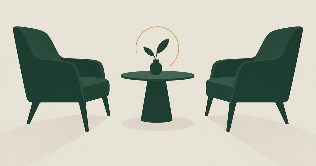 Two armchairs facing each other across a small table